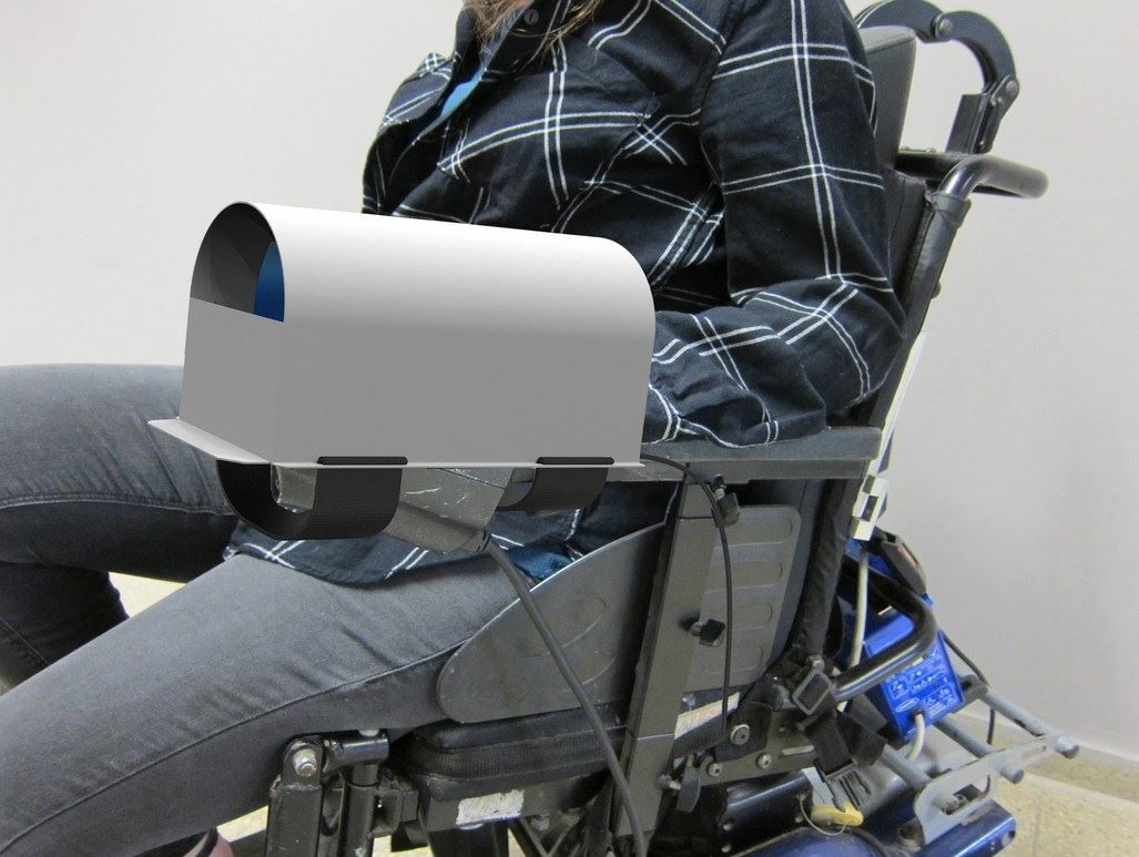 Hand-warming device for a hand operating the wheelchair